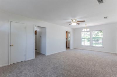 Living Area with entry closet | Image 3