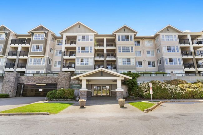 313 - 19673 Meadow Gardens Way, Condo with 2 bedrooms, 2 bathrooms and 2 parking in Pitt Meadows BC | Image 1