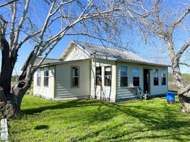 Front view of the home with enclosed porch | Image 32