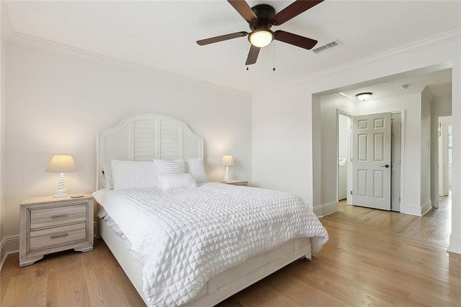 Primary bedroom with laundry room with enough space to convert to primary bath | Image 10