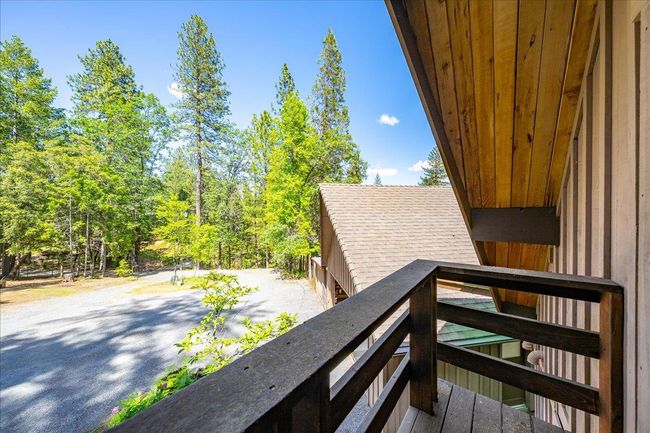 Upstairs balcony overlooks front yard | Image 47