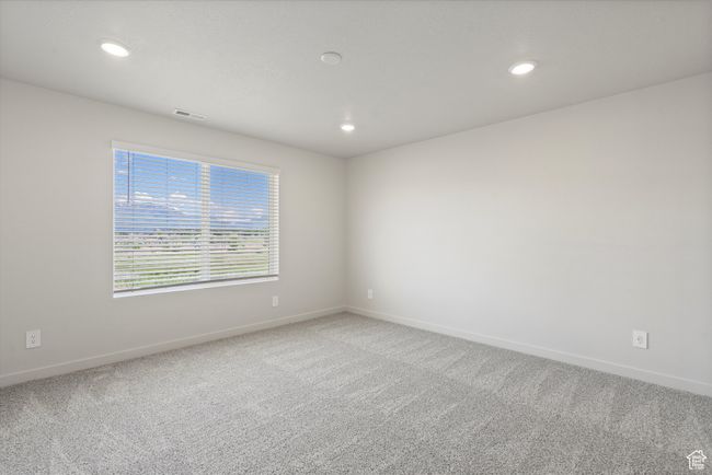 Empty room with carpet flooring and recessed lighting | Image 30