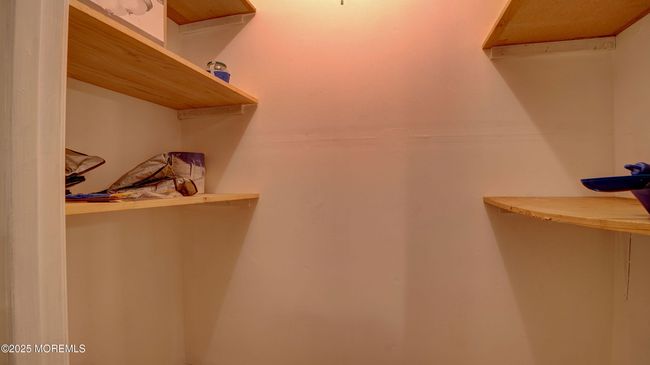 Large storage room in the porch. | Image 31