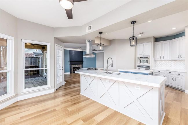 Imagine eating at your breakfast table by the bay window with the beautiful views out to the backyard! | Image 17
