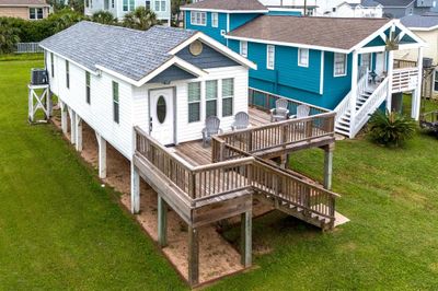 Welcome to 4115 Surf Drive located between Jamaica and Galveston Beaches. Close enough to get to Pleasure Pier and downtown Galveston, yet far enough away that your evenings and early mornings are nothing but peaceful. | Image 1