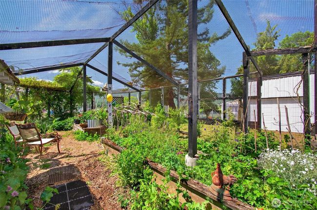 24X54 covered and fenced garden Conservatory with southern exposure. | Image 8