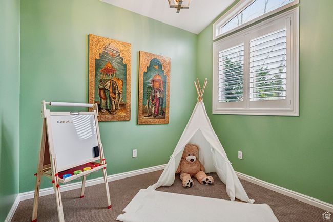 Rec room featuring carpet flooring off of large family room (could be office or small gym) | Image 22