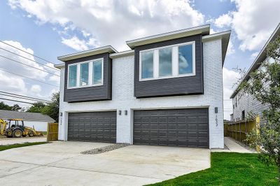 View of front of house with a garage | Image 2