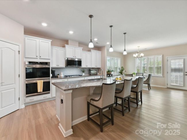 Upgraded "Gourmet Kitchen" Boasts of Built-in Wall Double Convection Ovens and Gas Range | Image 10