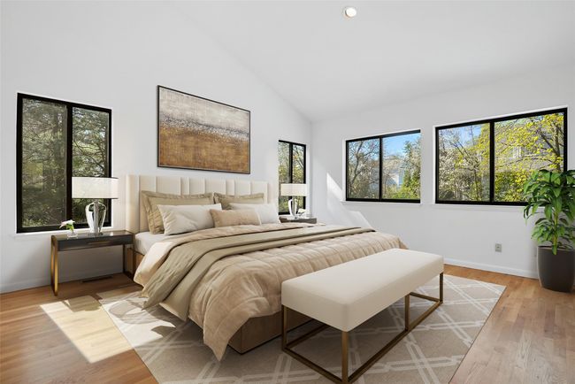 Virtually staged. Retreat to the spacious and gracious primary suite after a long day. | Image 19