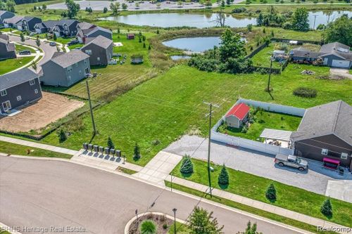 40 Grove Meadows Boulevard, Howell Twp, MI, 48855 | Card Image