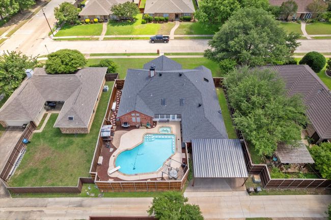 Aerial perspective of suburban area featuring a pool | Image 38