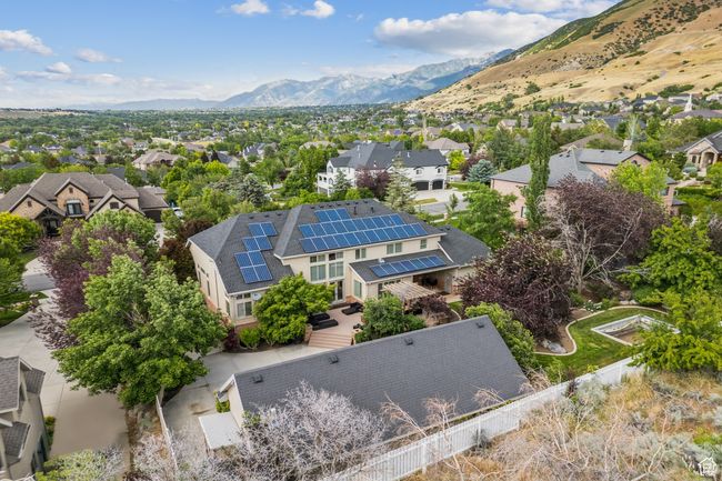 Aerial view of residential area with a mountain backdrop | Image 88
