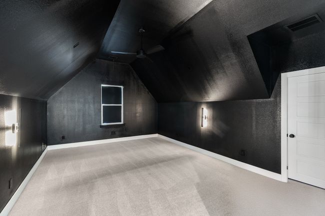 Additional living space with vaulted ceiling, carpet, a ceiling fan, and baseboards | Image 31