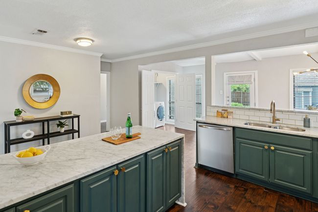 Let your inner chef loose in this gorgeous kitchen with gas range and plenty of counter space. | Image 14
