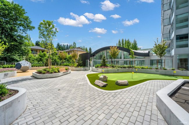 Surrounding community featuring a putting green | Image 31
