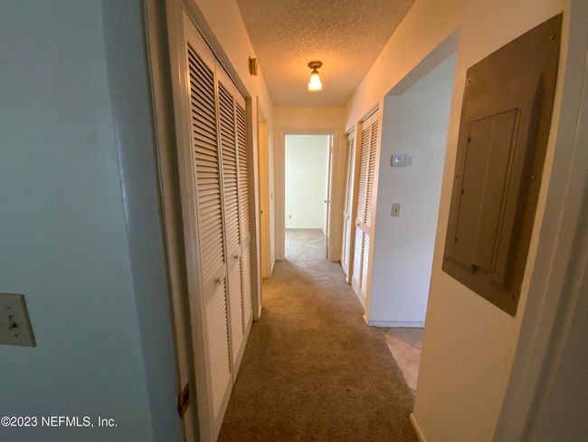 Hallway connects the 2 bedrooms | Image 16