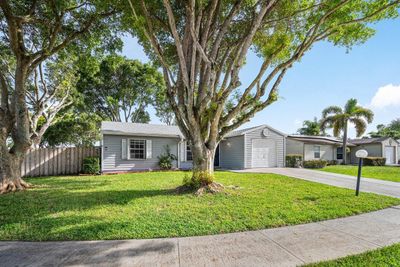 5183 Canal Circle S, House other with 3 bedrooms, 2 bathrooms and null parking in Lake Worth FL | Image 2