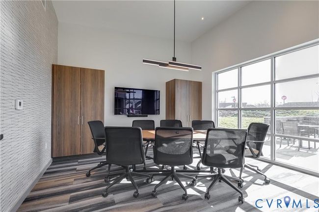 Dining space featuring a high ceiling | Image 26