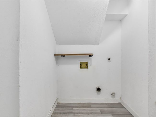 Laundry room in the garage | Image 17