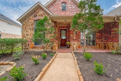 Step inside to find elegant hardwood, tile, and laminate flooring—completely free of carpet and no back neighbor! | Image 1