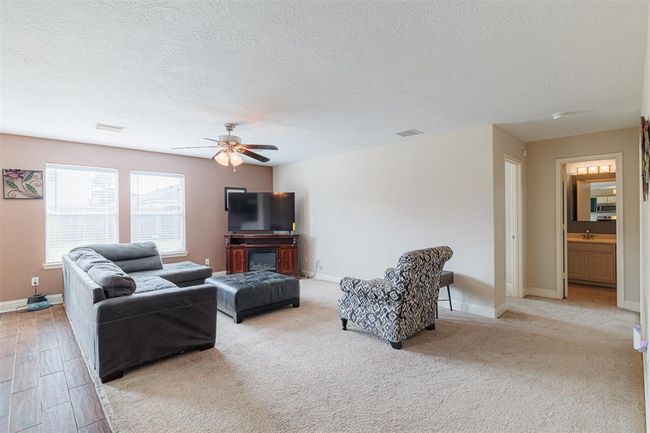 Spacious family room. | Image 11