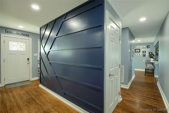 Hall with dark hardwood / wood-style flooring | Image 48