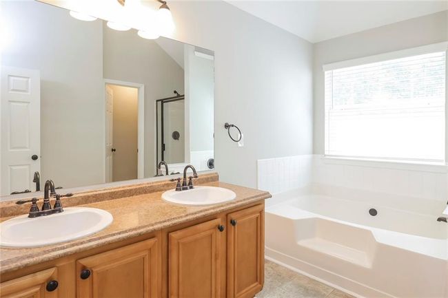 7677 Bowhead Ct, House other with 4 bedrooms, 3 bathrooms and null parking in Fairburn GA | Image 8