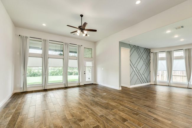 From this vantage point, you can see the guest suite entrance and get a beautiful waterfront view. | Image 28