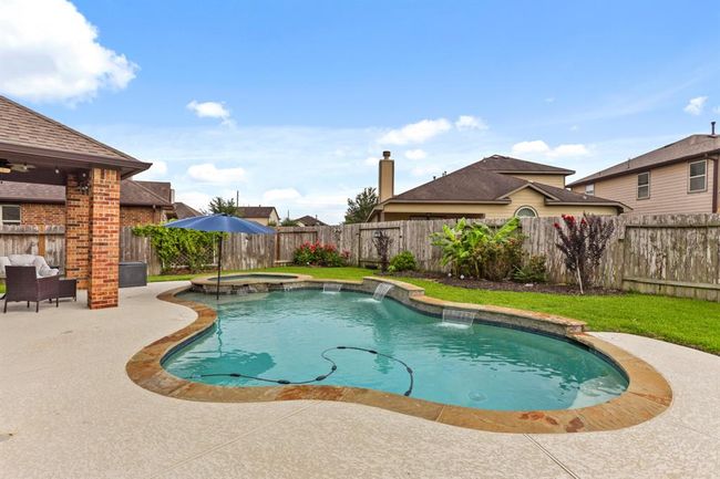 This backyard oasis is truly the perfect place to sit back and relax! | Image 21