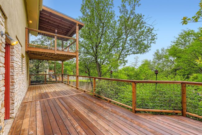 Upper and lower deck overlooking secluded backyard | Image 21
