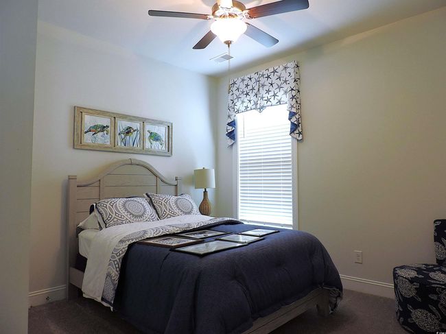 Carpeted bedroom with baseboards and ceiling fan | Image 27