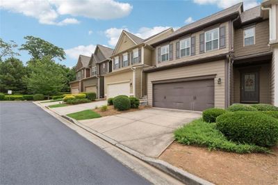 5667 Cobblestone Creek Place, Townhouse with 3 bedrooms, 2 bathrooms and 4 parking in Mableton GA | Image 1