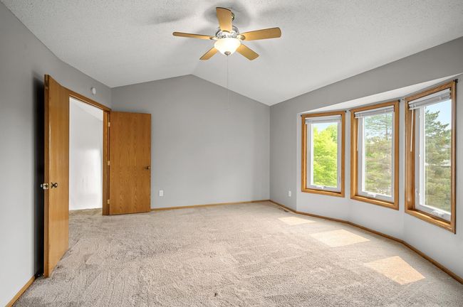 Double entry doors! And look at all that sunlight coming in the bay windows. Don't miss the fan/light combo. | Image 15