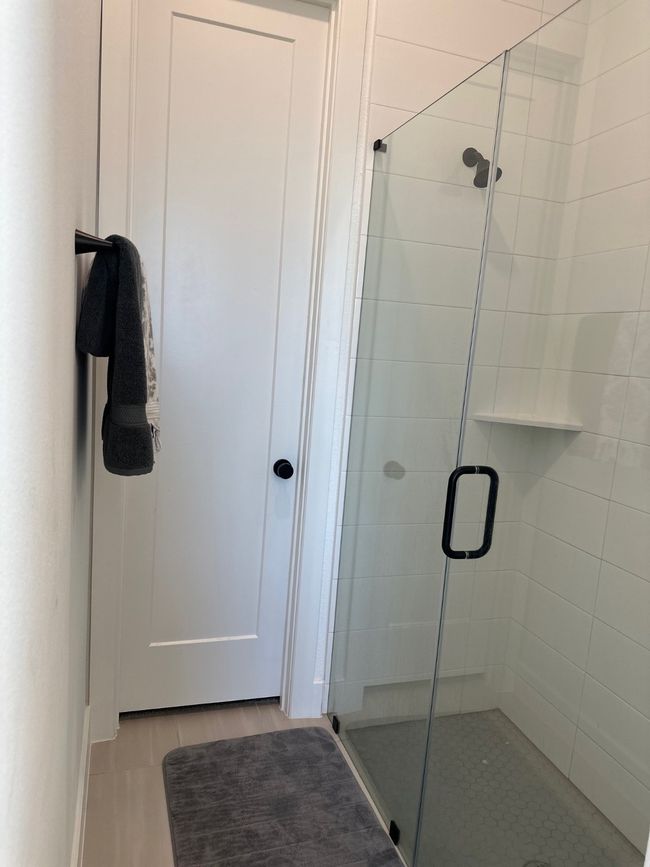 Bathroom with a stall shower | Image 29