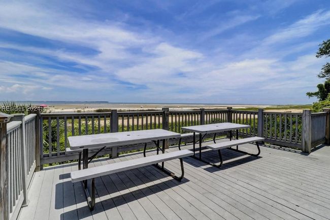 Wooden deck featuring a water view | Image 26