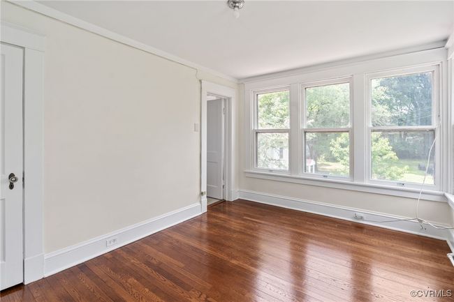 Bedroom with hardwood floors and baseboards | Image 34