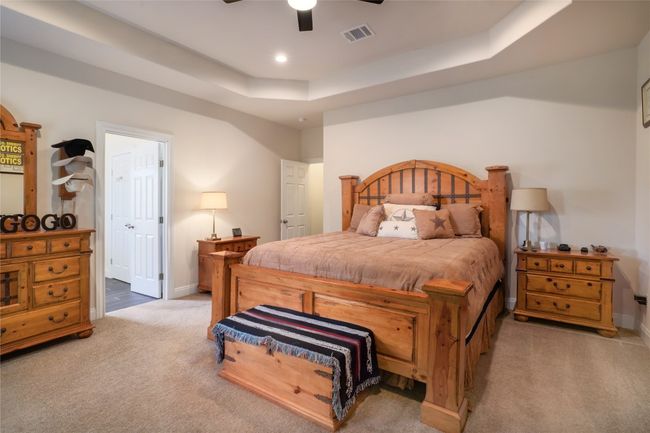 Upgraded trey ceiling for you to enjoy as you unwind your day. | Image 17