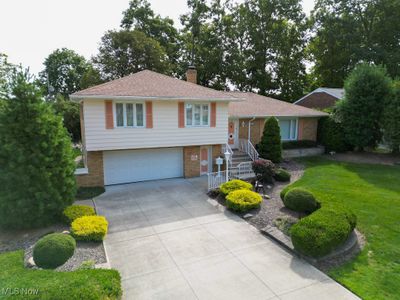 Newer driveway with decorative landscaping | Image 1