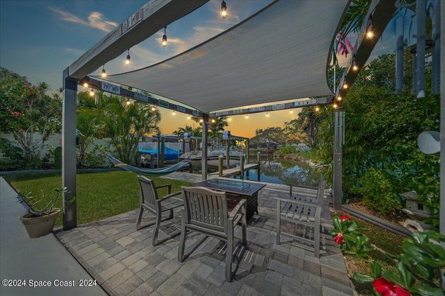 Riverside paved Gazebo area with a Sunshade Sail | Image 7