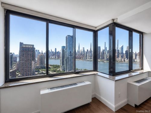 29h-4-74 48th Avenue, New York, NY, 11109 | Card Image