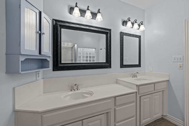 Primary bathroom with double vanity, tub and shower | Image 18