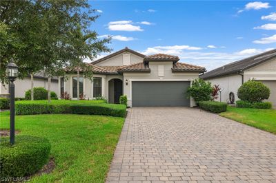 17021 Ashcomb Way, House other with 4 bedrooms, 2 bathrooms and null parking in Estero FL | Image 1