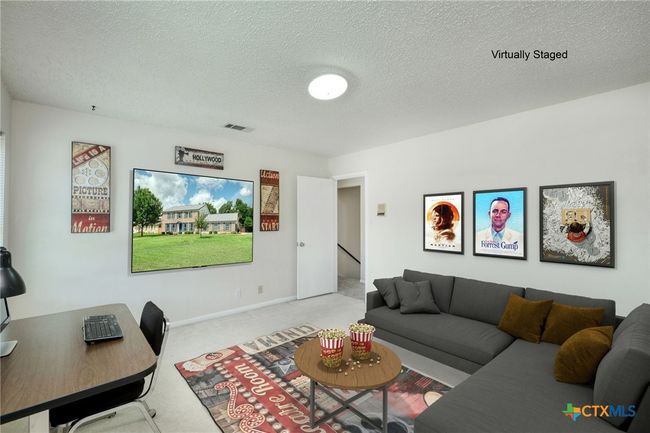 5th Bedroom Virtually Staged as a media room | Image 23