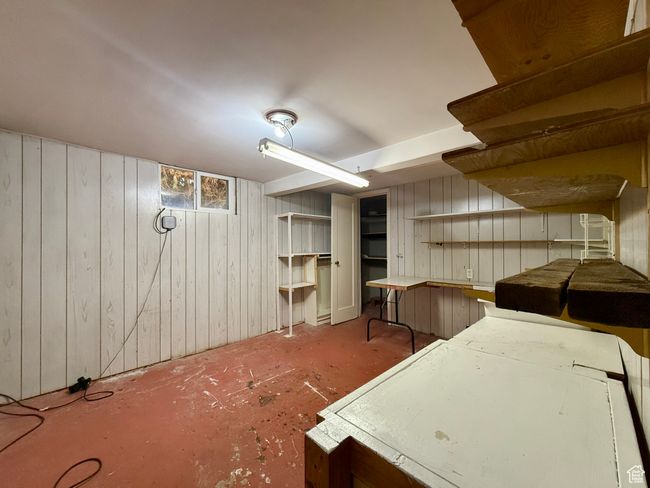 Miscellaneous room with wooden walls | Image 37