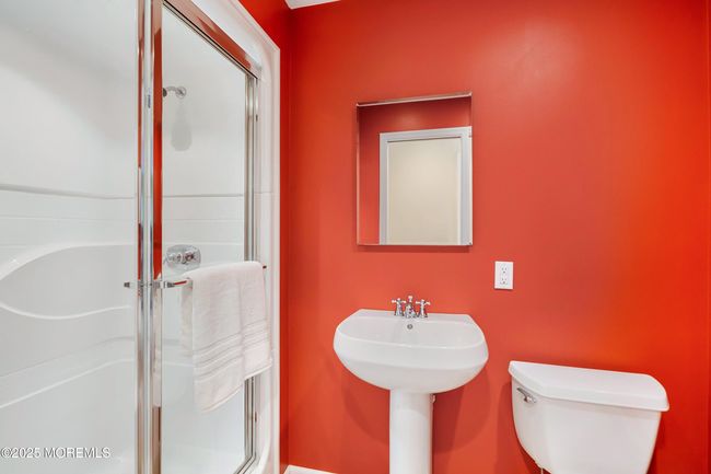 Full bath in basement is perfect for guest room and access to pool | Image 39