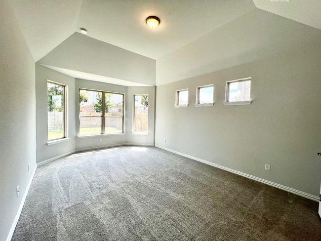 Unfurnished room featuring carpet floors and baseboards | Image 12