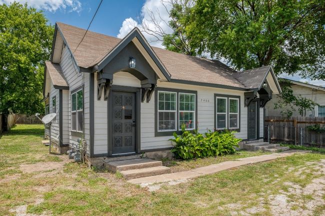 View of front facade with a shingled roof | Image 19