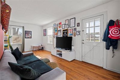 Living room featuring wood-type flooring | Image 3