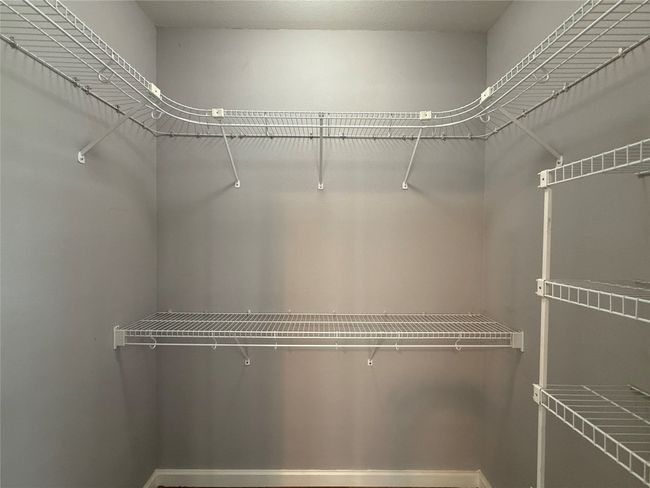 View of spacious closet | Image 14